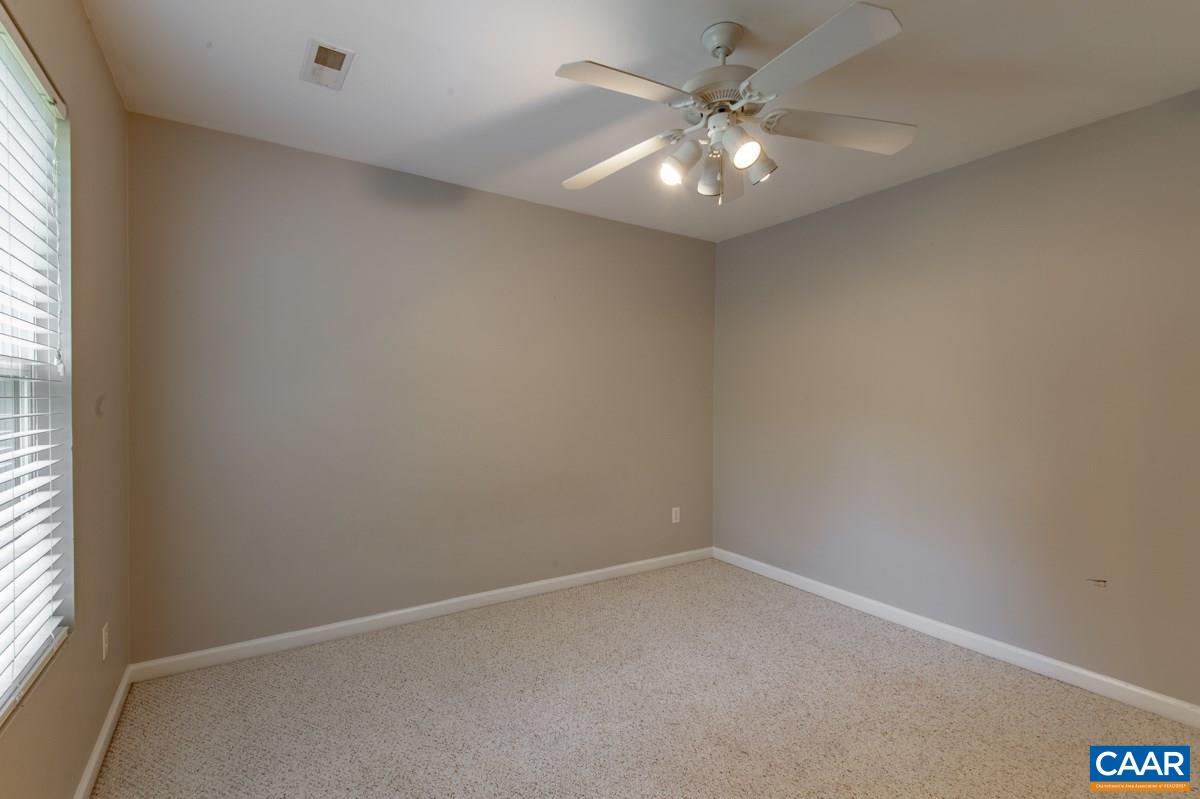 3 Bernardsburg Road Palmyra, VA 22963 - Photo 23 of 38 an empty room with a window and a fan