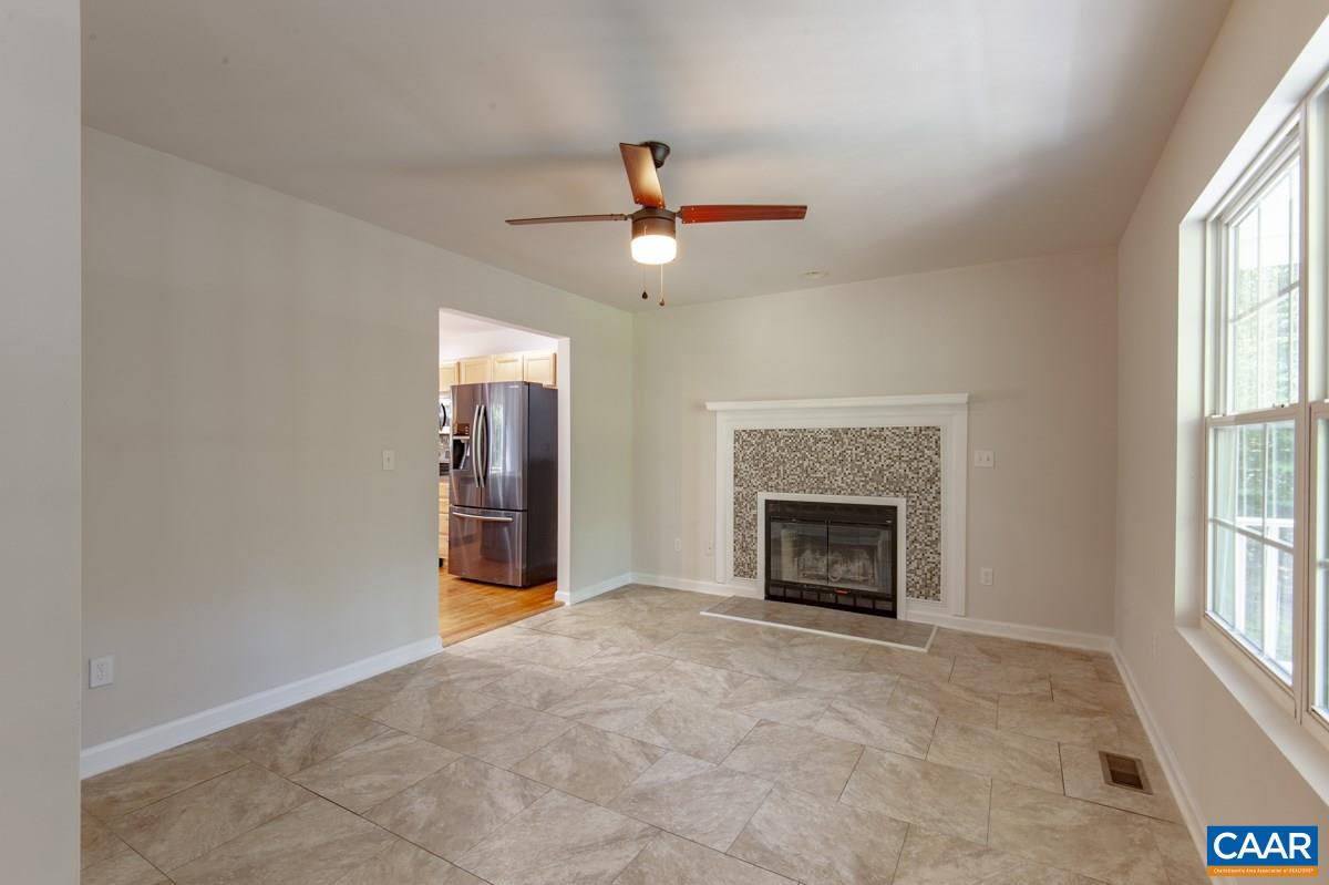 3 Bernardsburg Road Palmyra, VA 22963 - Photo 6 of 38 an empty room with windows and fireplace