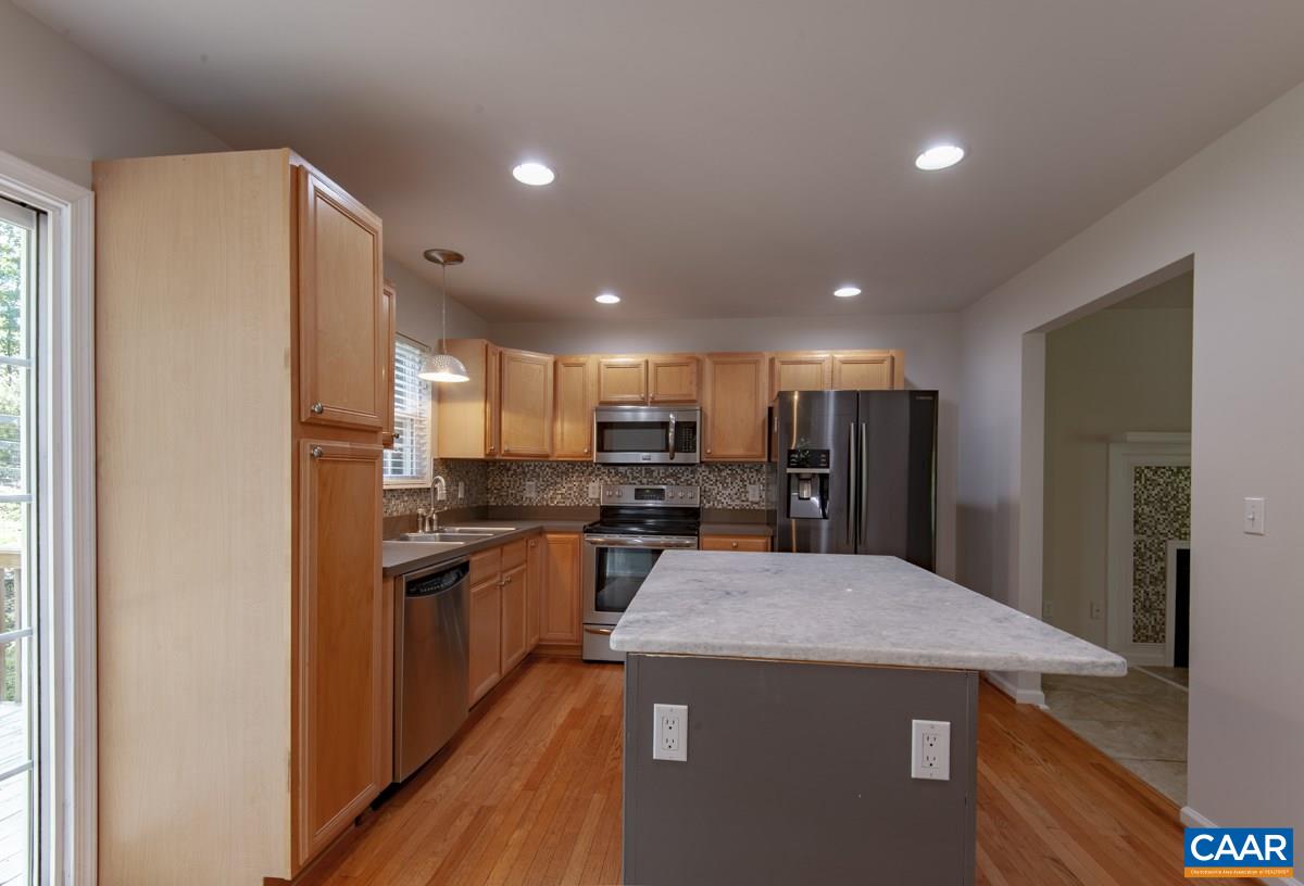 3 Bernardsburg Road Palmyra, VA 22963 - Photo 8 of 38 a kitchen with kitchen island a sink stove and refrigerator