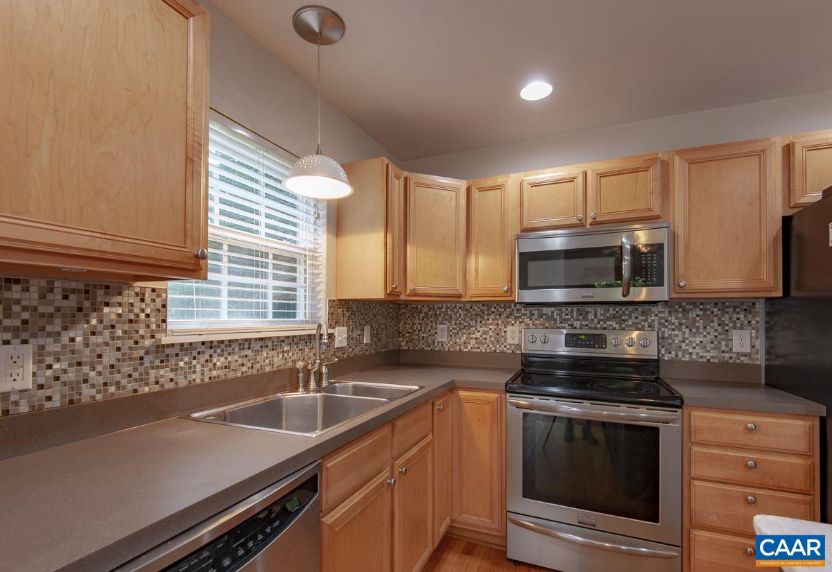 3 Bernardsburg Road Palmyra, VA 22963 - Photo 9 of 38 a kitchen with stainless steel appliances a sink a stove a microwave and cabinets
