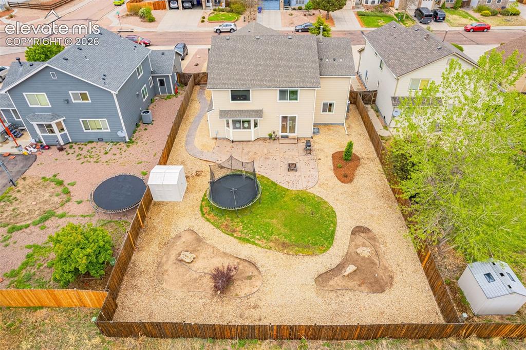 9127 Oakmont Road Peyton, CO 80831 - Photo 41 of 49 an aerial view of residential houses with outdoor space