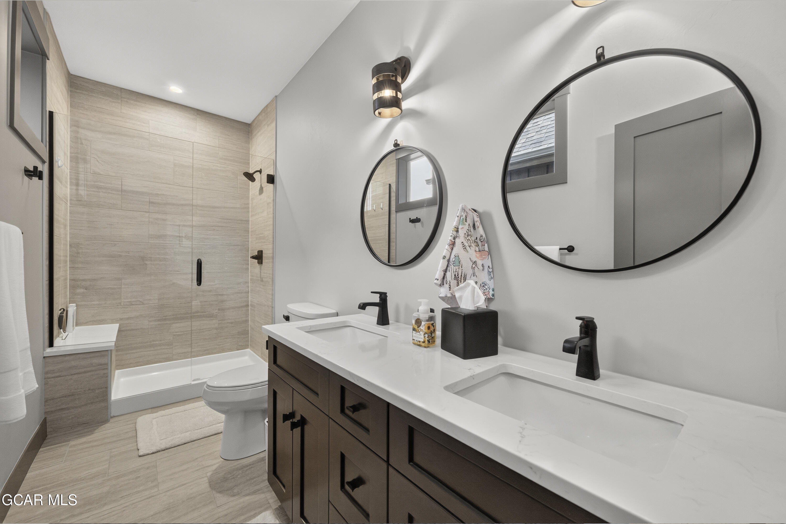 154 Eagle Ridge Drive Granby, CO 80446 - Photo 36 of 59 a bathroom with a sink and a mirror
