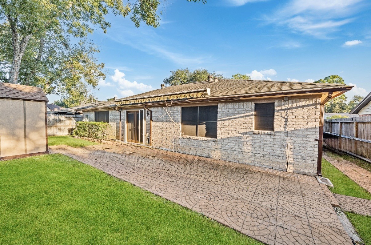 4822 Lost Oak Drive Spring, TX 77388 - Photo 13 of 14 a view of a house with a backyard