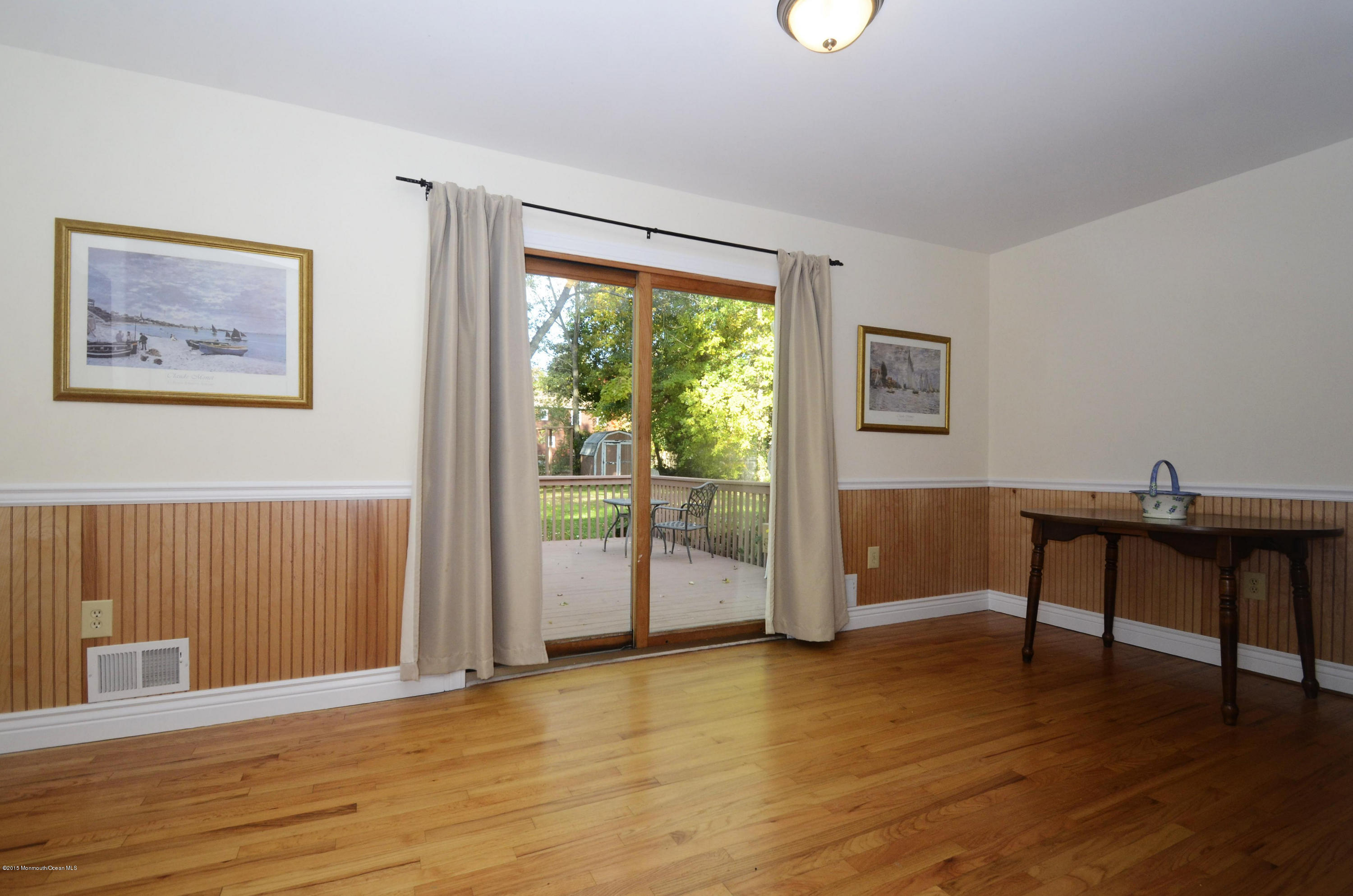 57 Middlesex Road Matawan, NJ 07747 - Photo 4 of 23 a view of a workspace with furniture and a window