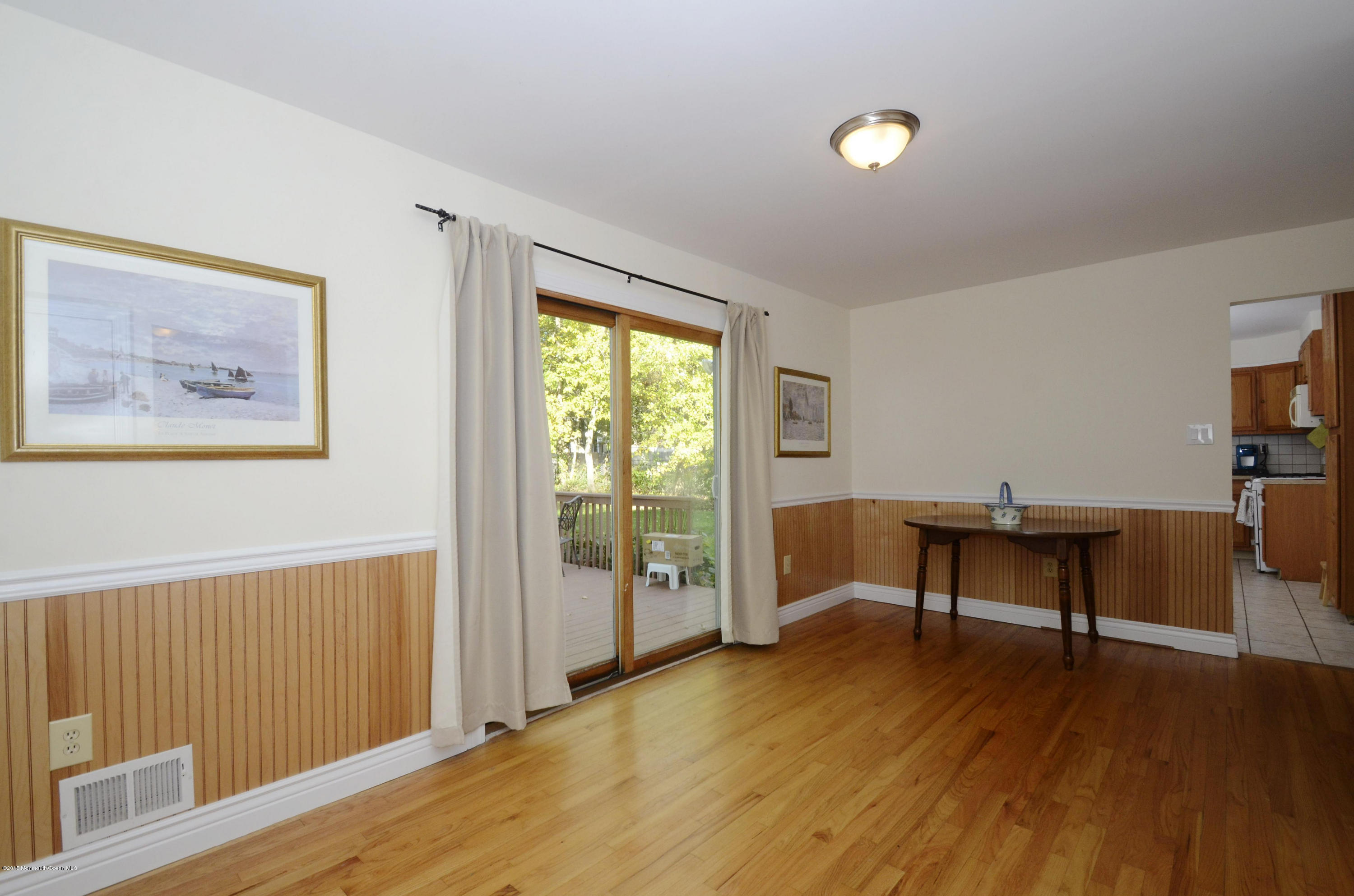 57 Middlesex Road Matawan, NJ 07747 - Photo 6 of 23 a view of a livingroom with furniture and a window
