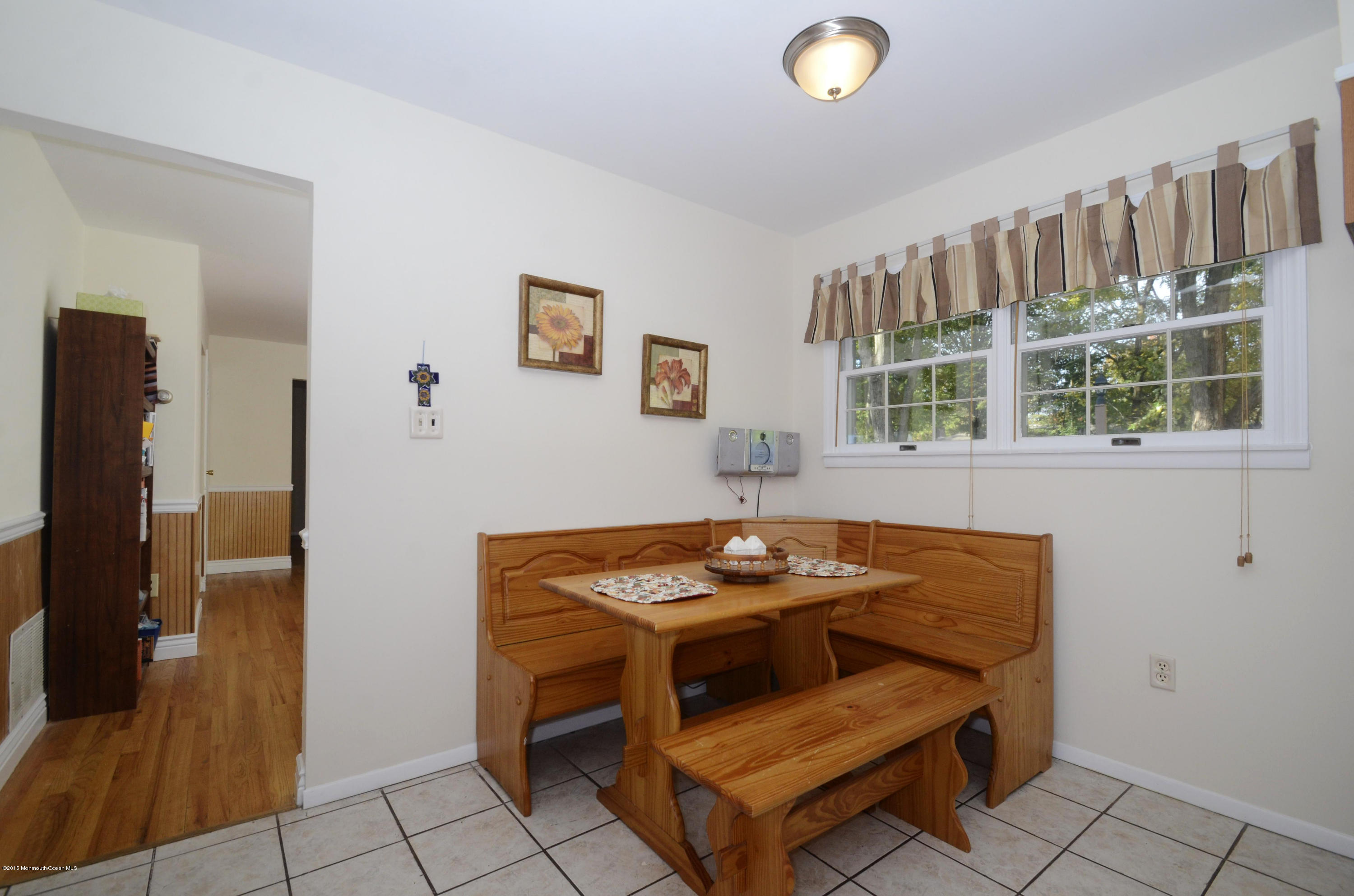57 Middlesex Road Matawan, NJ 07747 - Photo 8 of 23 a dining room with furniture and a window