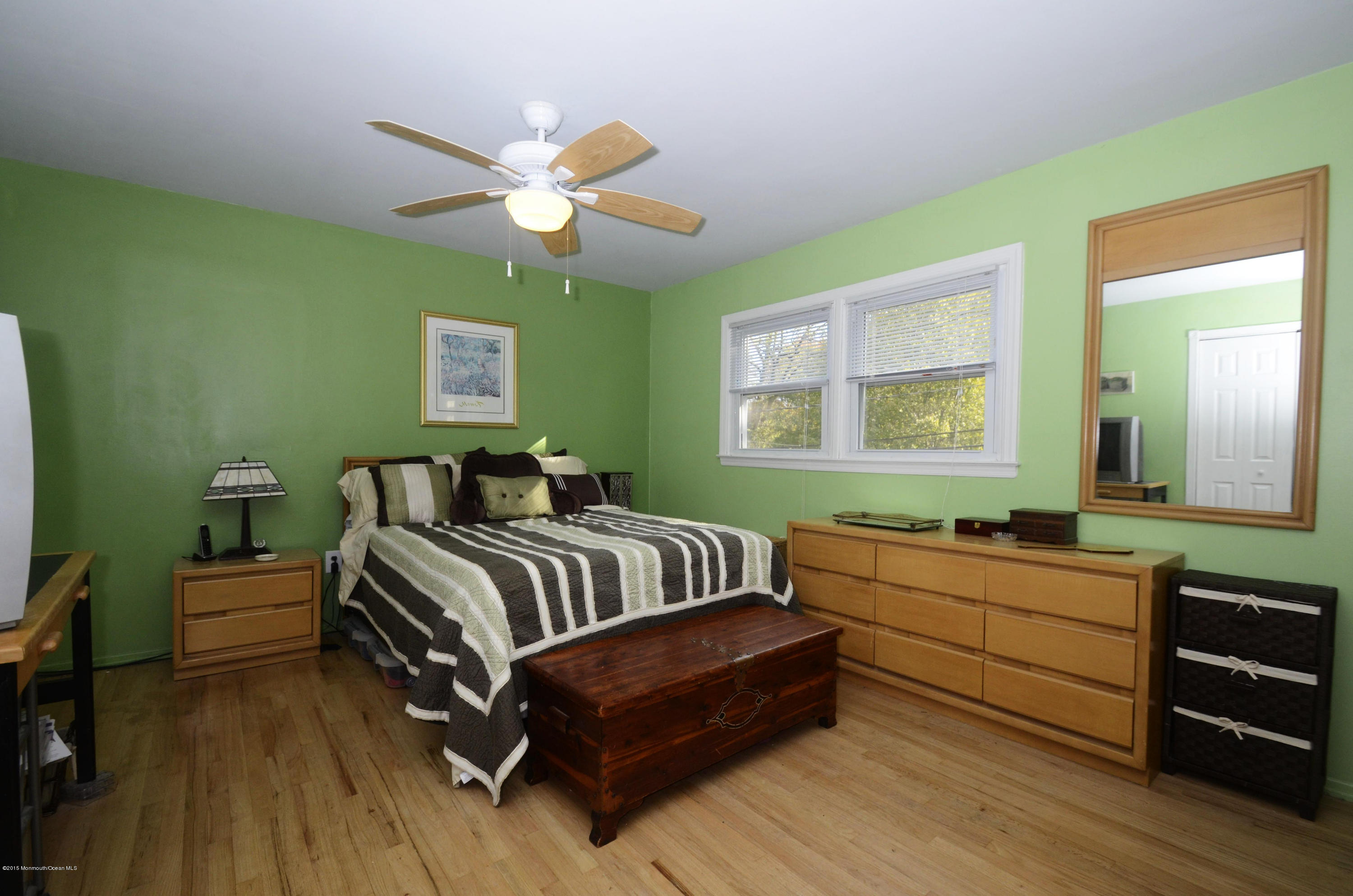 57 Middlesex Road Matawan, NJ 07747 - Photo 10 of 23 a bedroom with a bed and a dresser