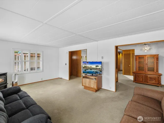 a living room with furniture and a couch