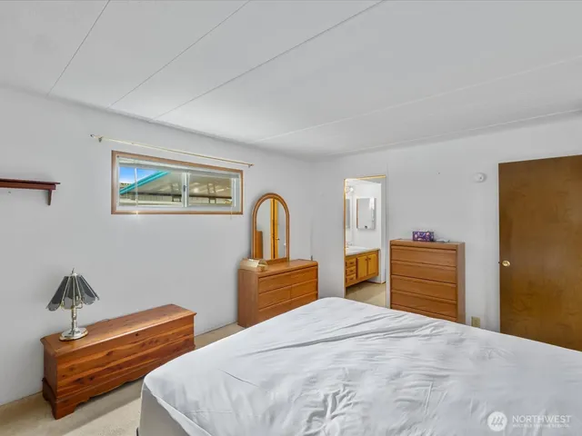 a bathroom with a sink double vanity and a mirror