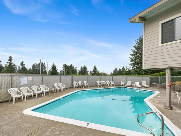 a view of street with parked cars