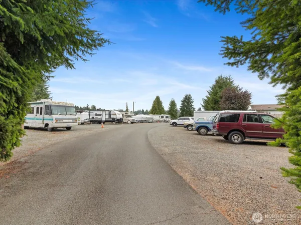 a view of a backyard of a house