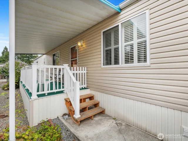a balcony view with a garden