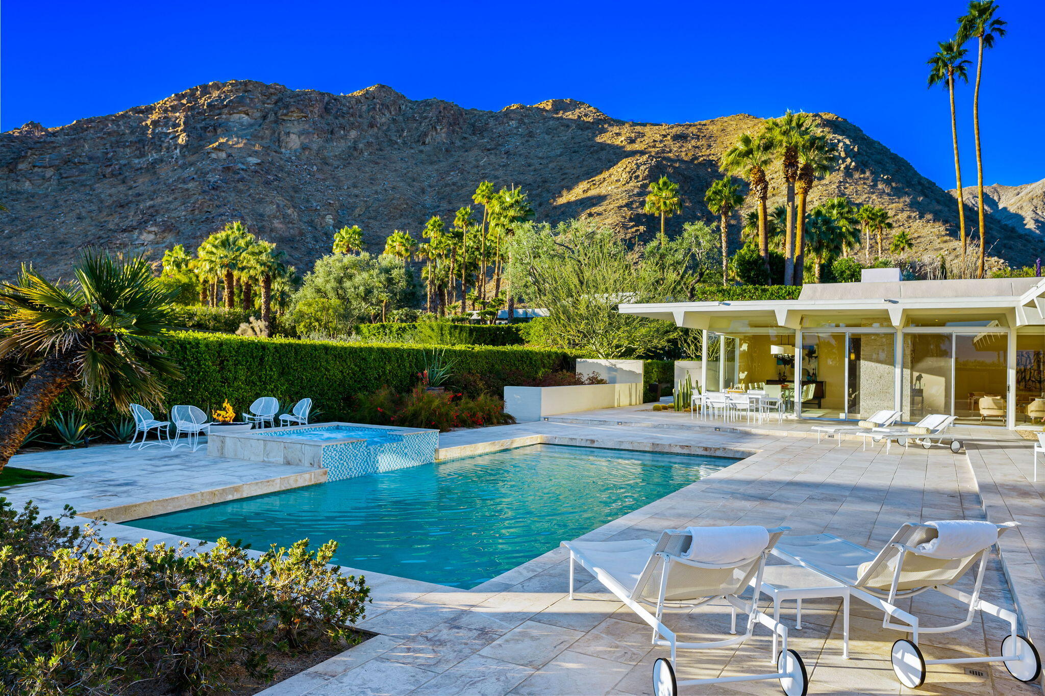 40780 Thunderbird Road Rancho Mirage, CA 92270 - Photo 25 of 29 a view of a chairs and table in the patio