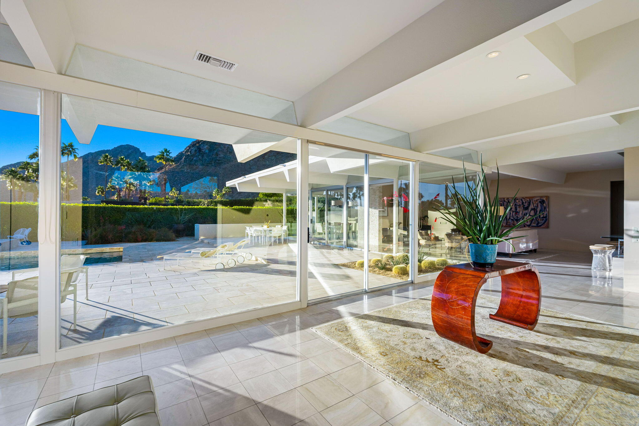 40780 Thunderbird Road Rancho Mirage, CA 92270 - Photo 6 of 29 a lobby with furniture and floor to ceiling window