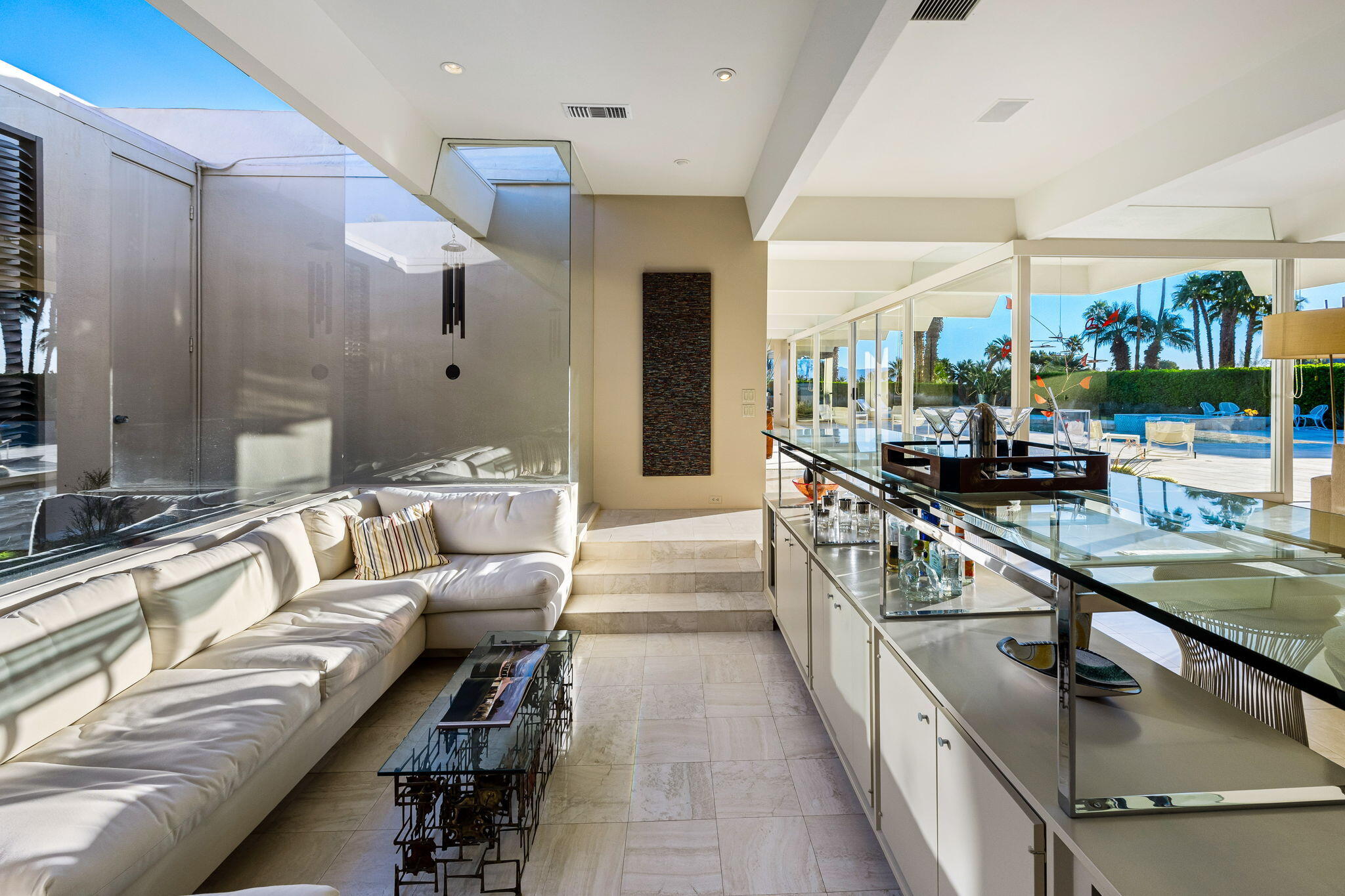 40780 Thunderbird Road Rancho Mirage, CA 92270 - Photo 9 of 29 a living room with furniture and a large window