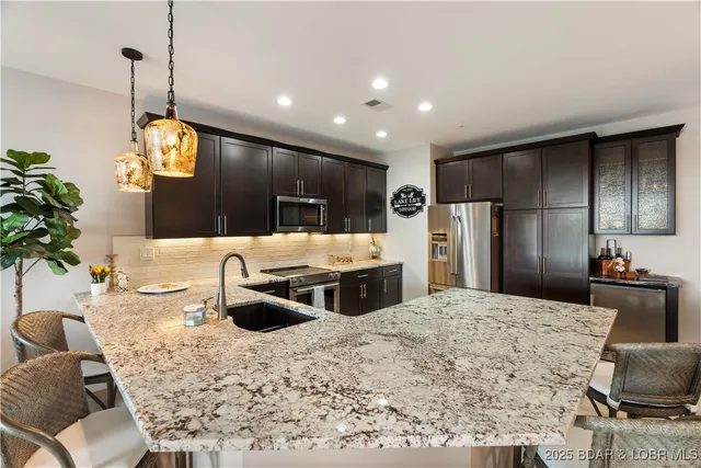 $799,000 | 166 Captiva Drive, Unit 6D, Sunrise Beach, MO 65079