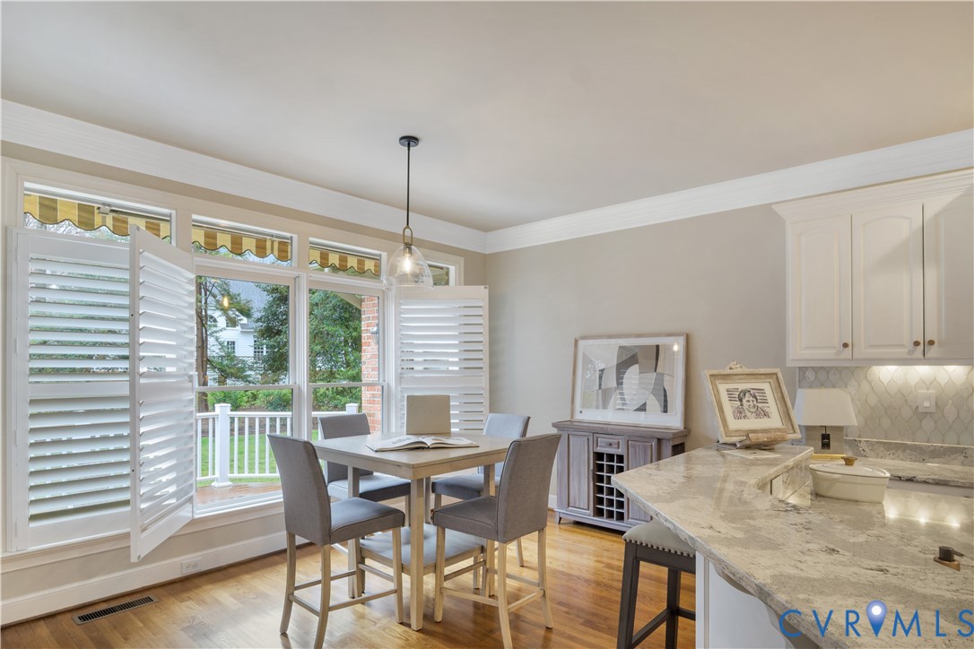 2509 Nathaniell Powell Road Williamsburg, VA 23185 - Photo 20 of 53 a view of a dining room with furniture window and outside view