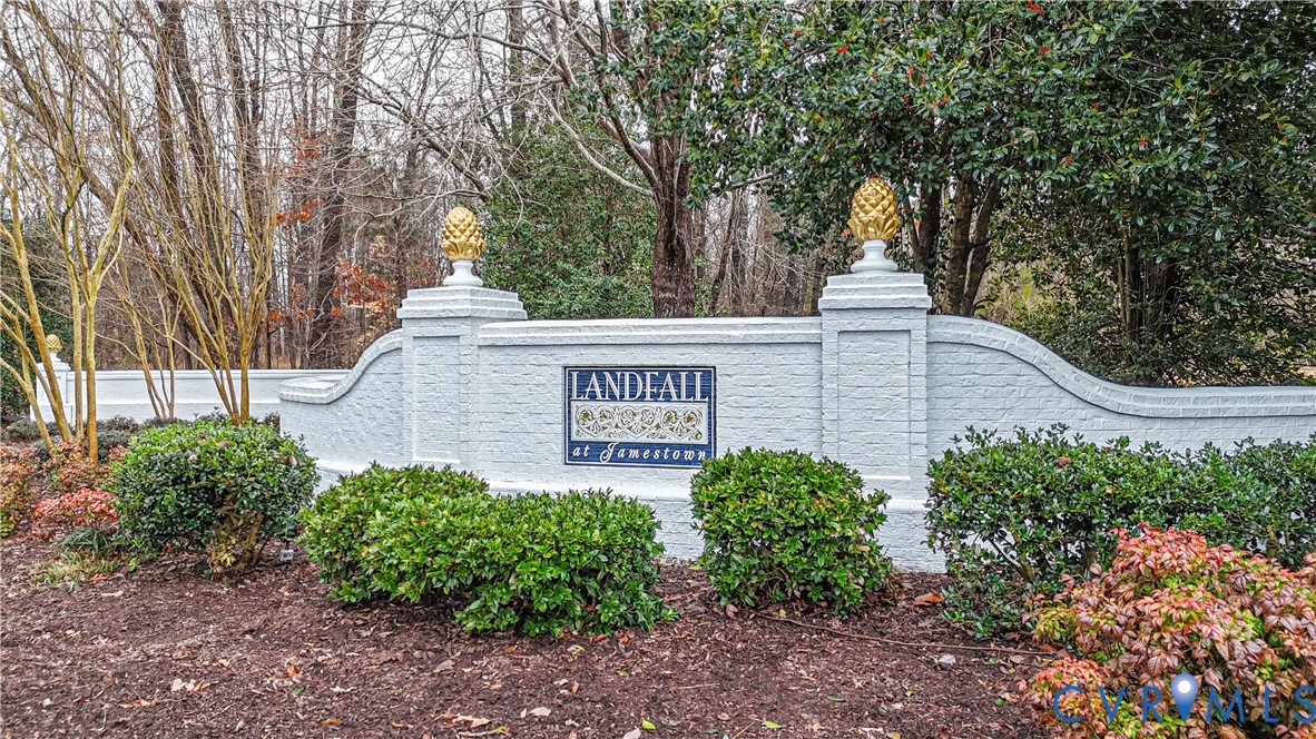 2509 Nathaniell Powell Road Williamsburg, VA 23185 - Photo 2 of 53 a sign that is sitting in front of a bunch of flowers