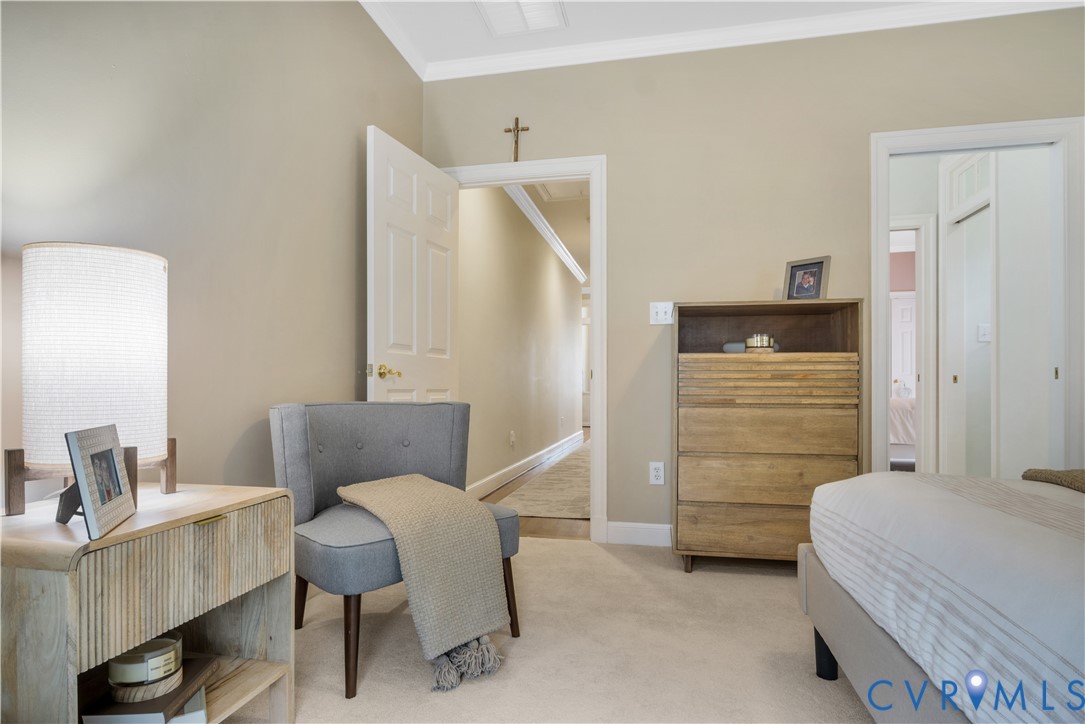 2509 Nathaniell Powell Road Williamsburg, VA 23185 - Photo 24 of 53 a bedroom with a bed and furniture