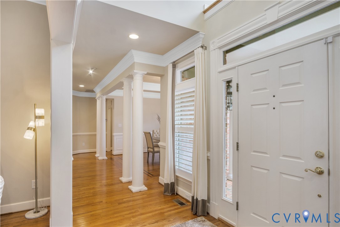 2509 Nathaniell Powell Road Williamsburg, VA 23185 - Photo 4 of 53 a view of a hallway with wooden floor and staircase
