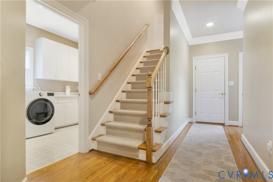 2509 Nathaniell Powell Road Williamsburg, VA 23185 - Photo 41 of 53 a view of entryway and hall with wooden floor