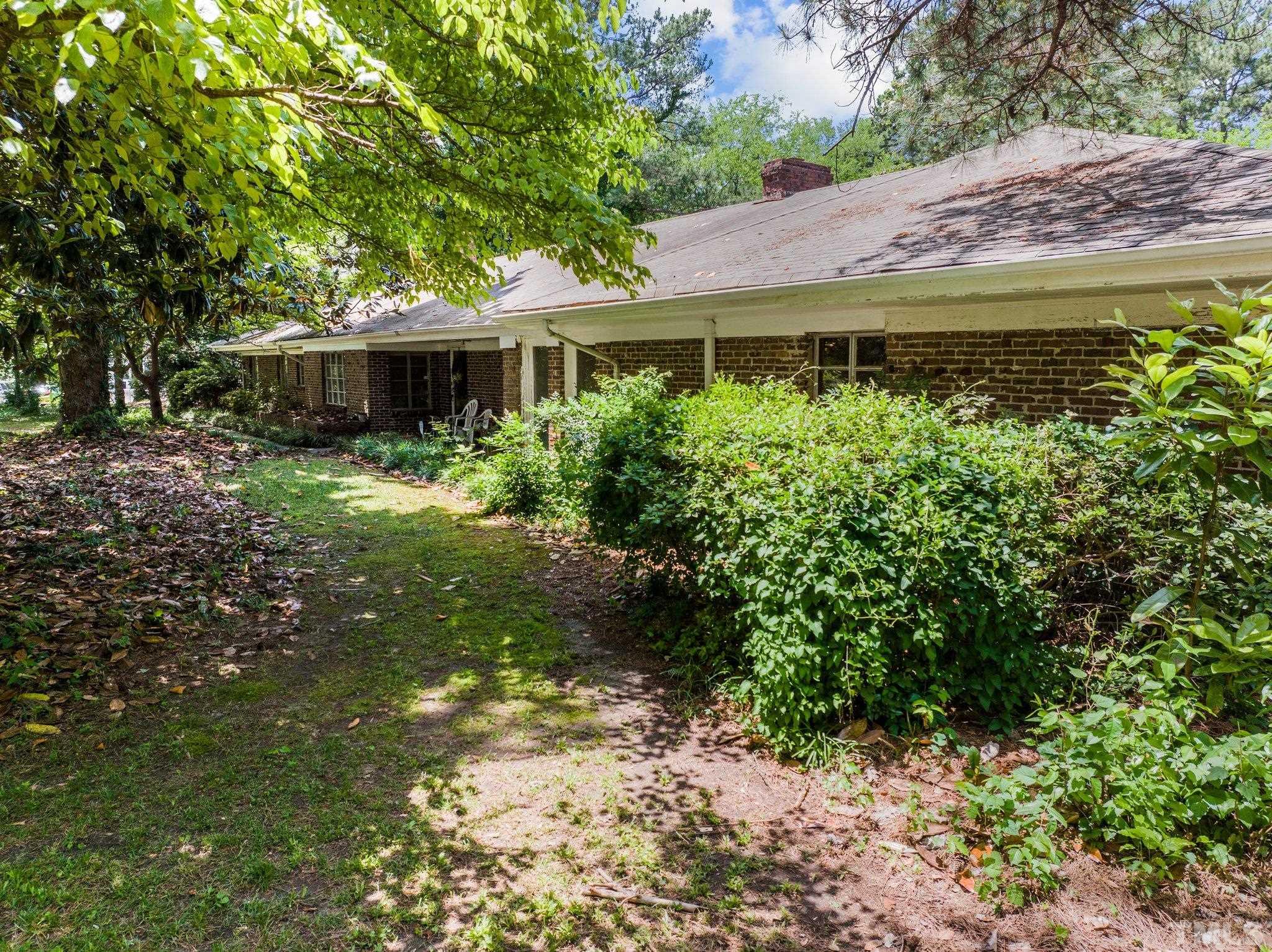 125 King William Road Raleigh, NC 27610 - Photo 12 of 33 a front view of a house with a yard