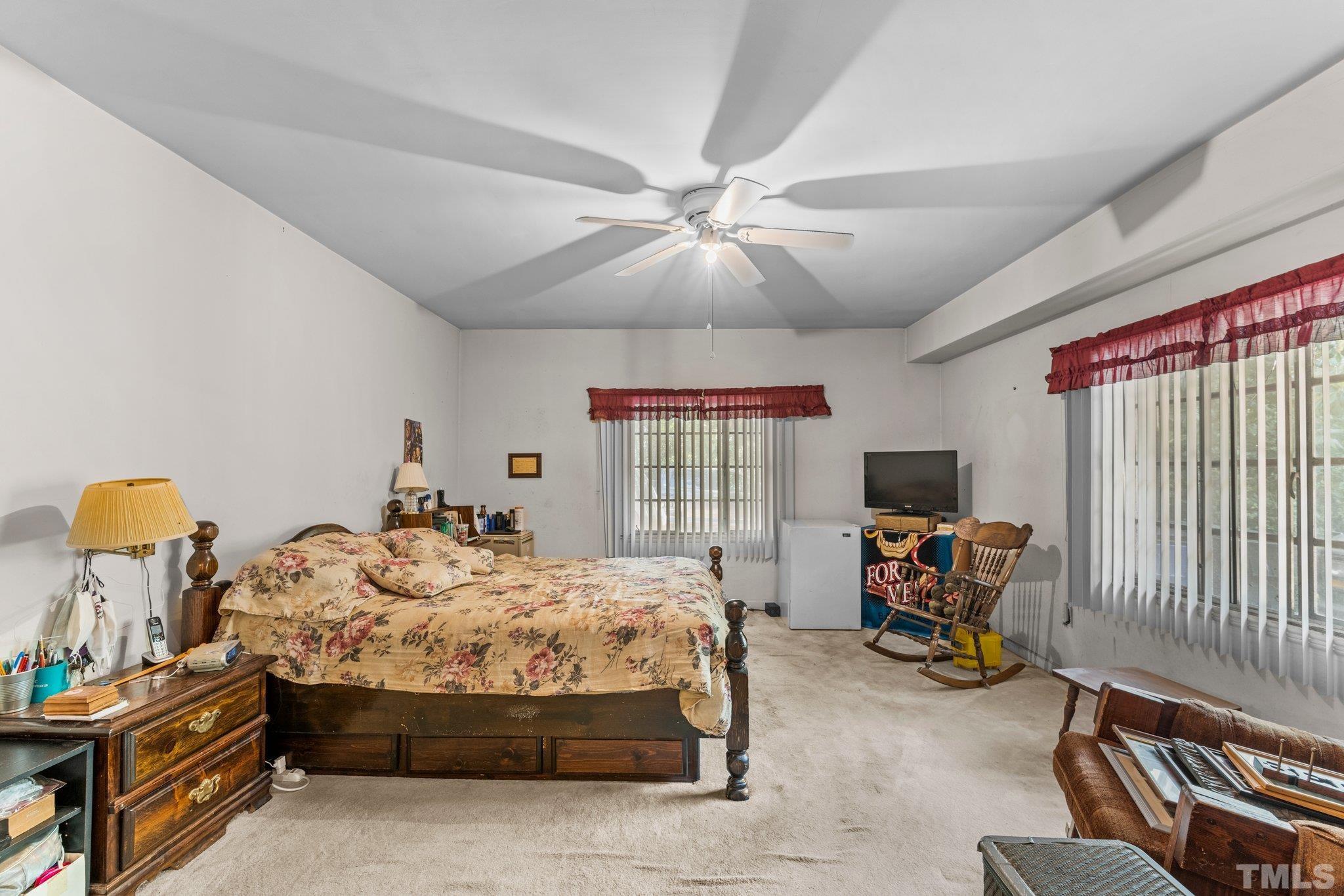 125 King William Road Raleigh, NC 27610 - Photo 31 of 33 a bedroom with furniture and a window