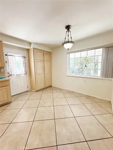 a kitchen that has a sink and a stove