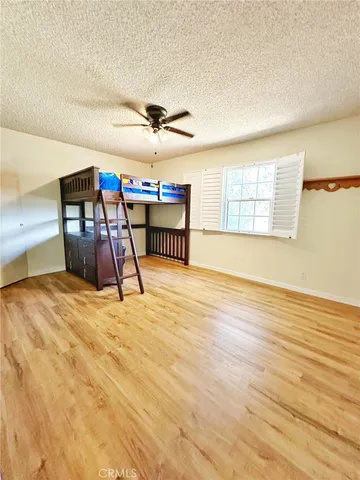 a spacious bathroom with a double vanity sink mirror and a bathtub
