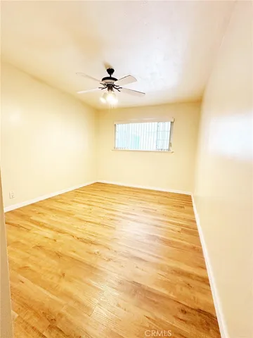 a view of a house with garden and patio