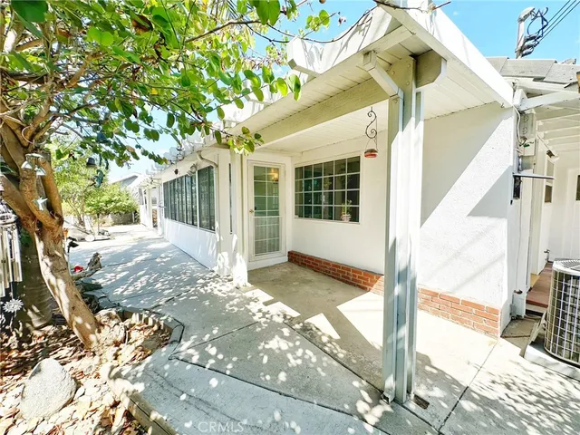 a view of a building with a porch
