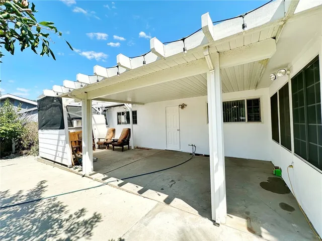 a view of a swimming pool with a patio