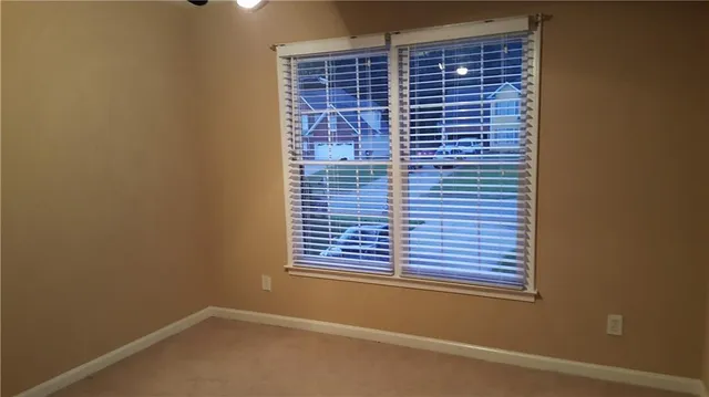 a view of a window in an empty room