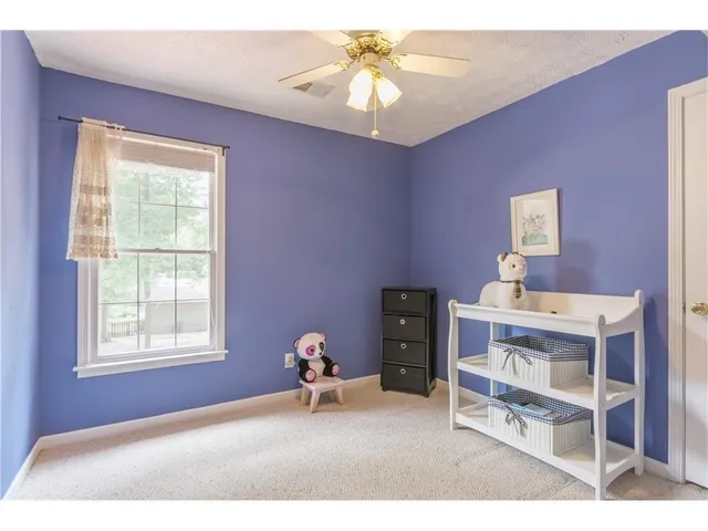 a view of a hallway with workspace