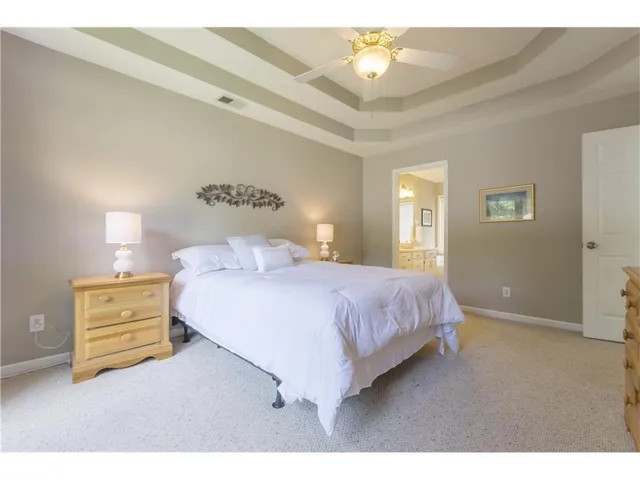 a bathroom with a sink vanity and a mirror