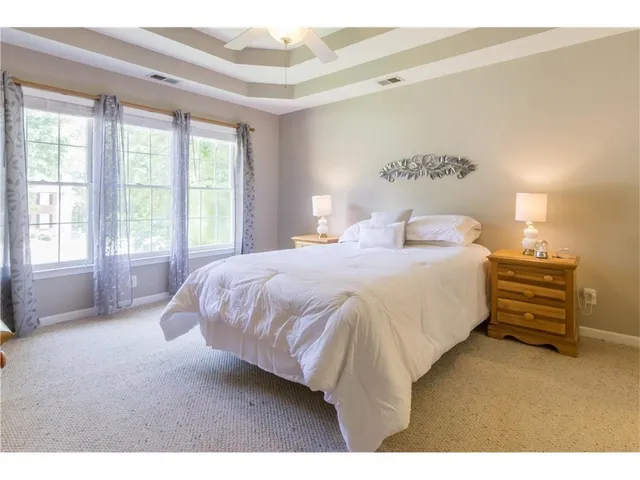 a bathroom with a sink a mirror and a bathtub