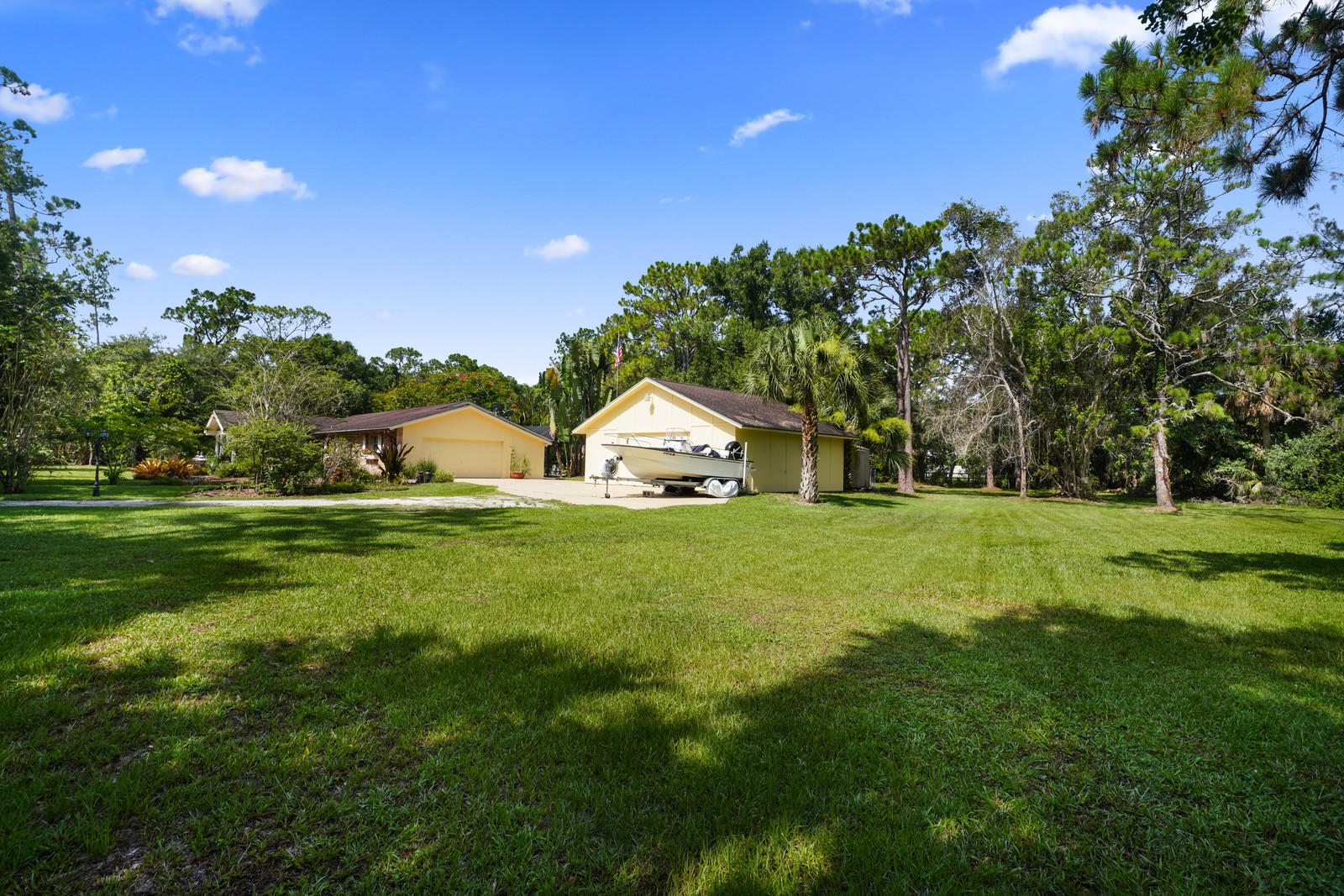 17089 Thunder Road Jupiter, FL 33478 - Photo 2 of 36 North side elevation