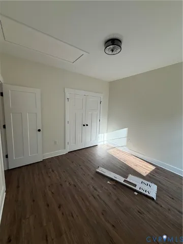 a view of a livingroom with wooden floor