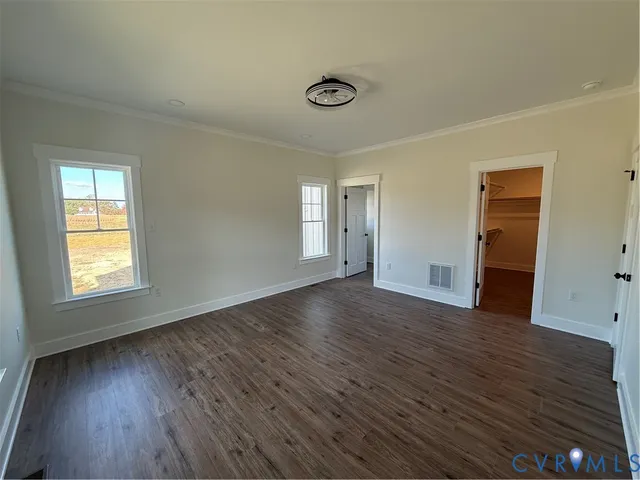 a view of an empty walk in closet