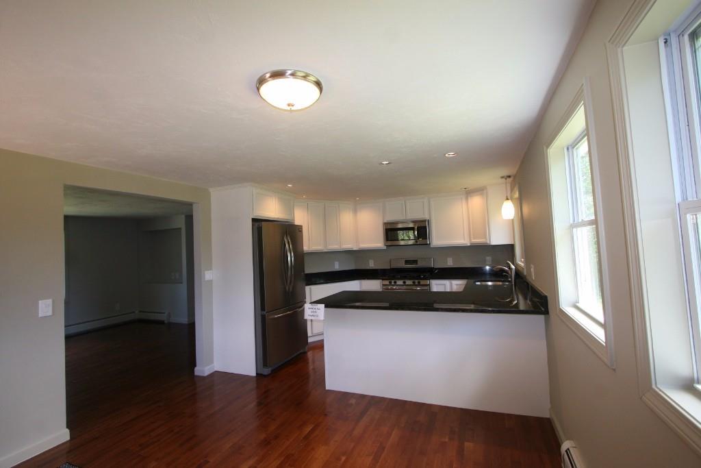 4 Betty Welch Road York, ME 03909 - Photo 5 of 35 NEW KITCHEN WITH VERDE PEACOCK...
