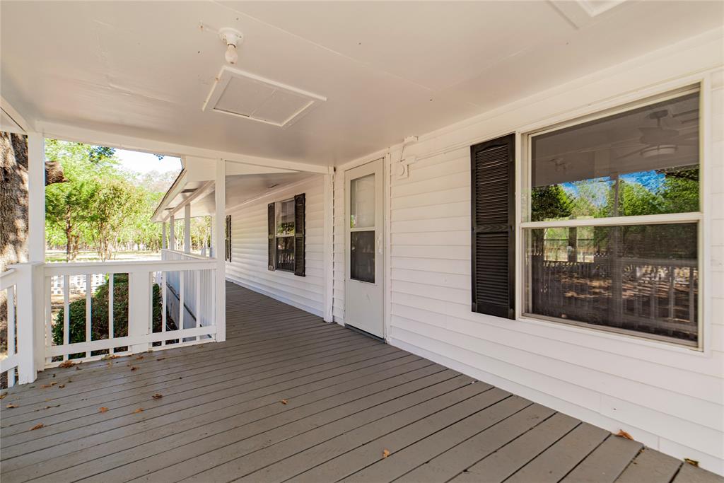667 Rs County Road 1503 Point, TX 75472 - Photo 28 of 38 a view of a porch with wooden floor and outdoor space