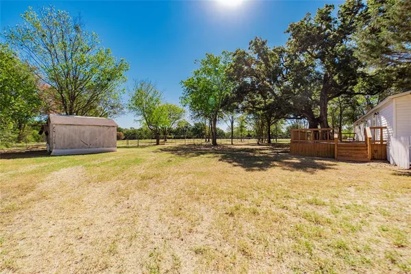 a house with trees in front of it