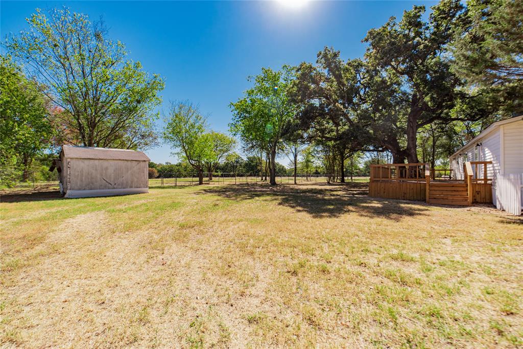 667 Rs County Road 1503 Point, TX 75472 - Photo 33 of 38 a house with trees in front of it