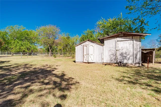 a view of large house with a yard