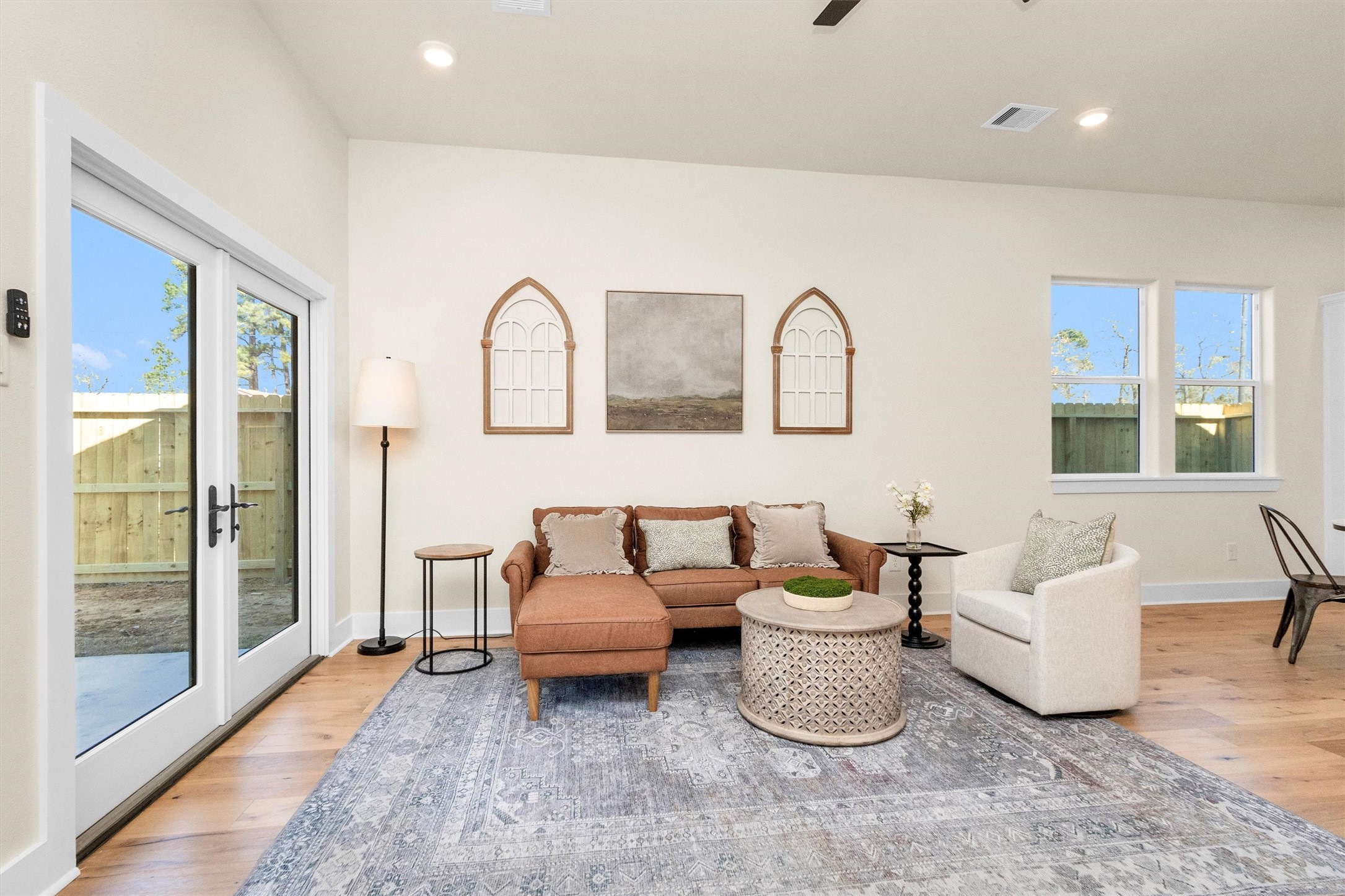 104 Canary St Point Point Blank, TX 77364 - Photo 11 of 28 a living room with furniture and a large window