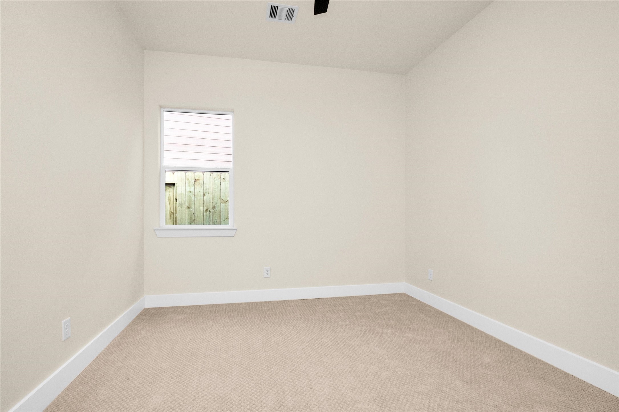 104 Canary St Point Point Blank, TX 77364 - Photo 17 of 28 an empty room with a window