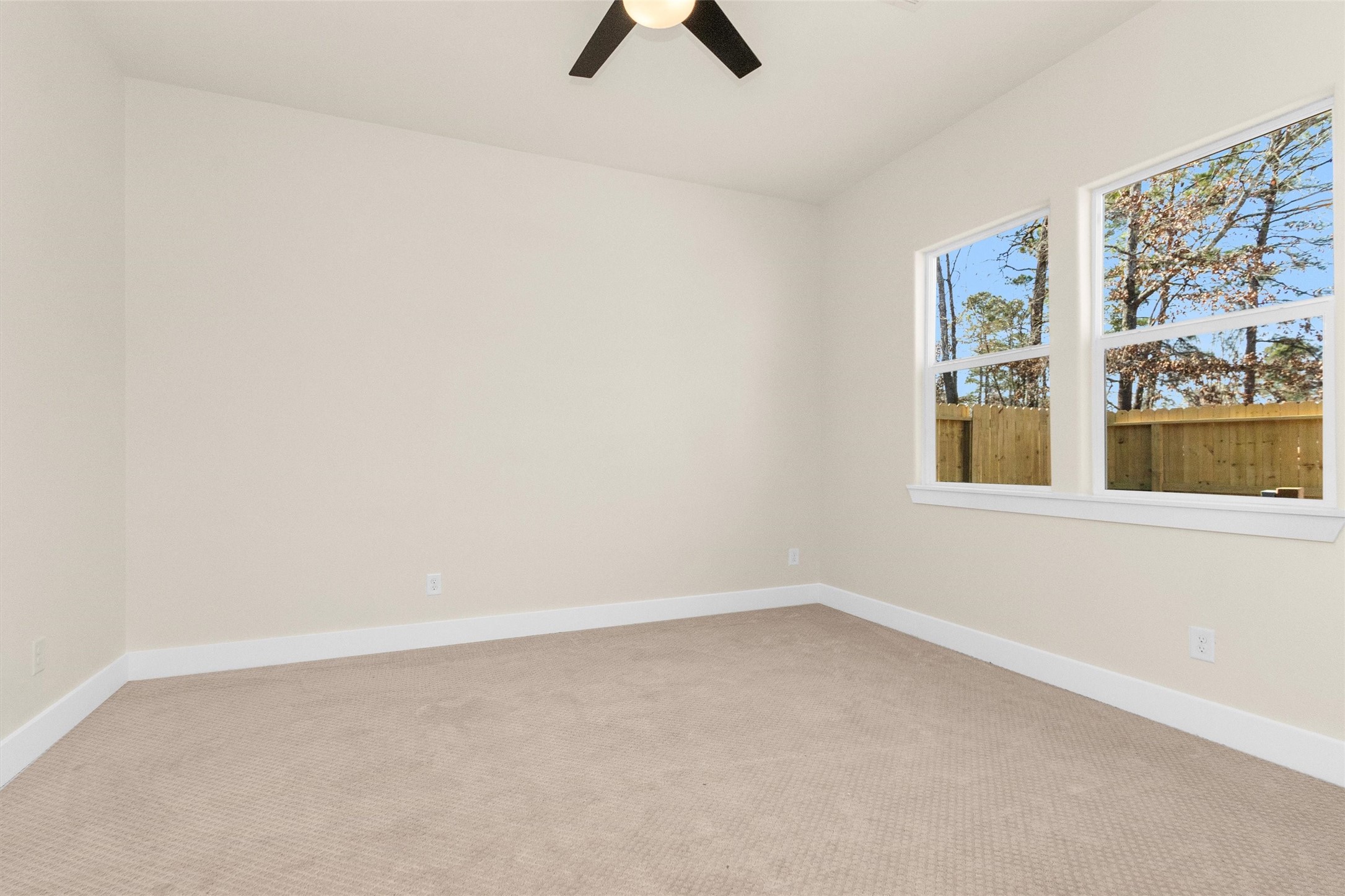 104 Canary St Point Point Blank, TX 77364 - Photo 20 of 28 an empty room with a window