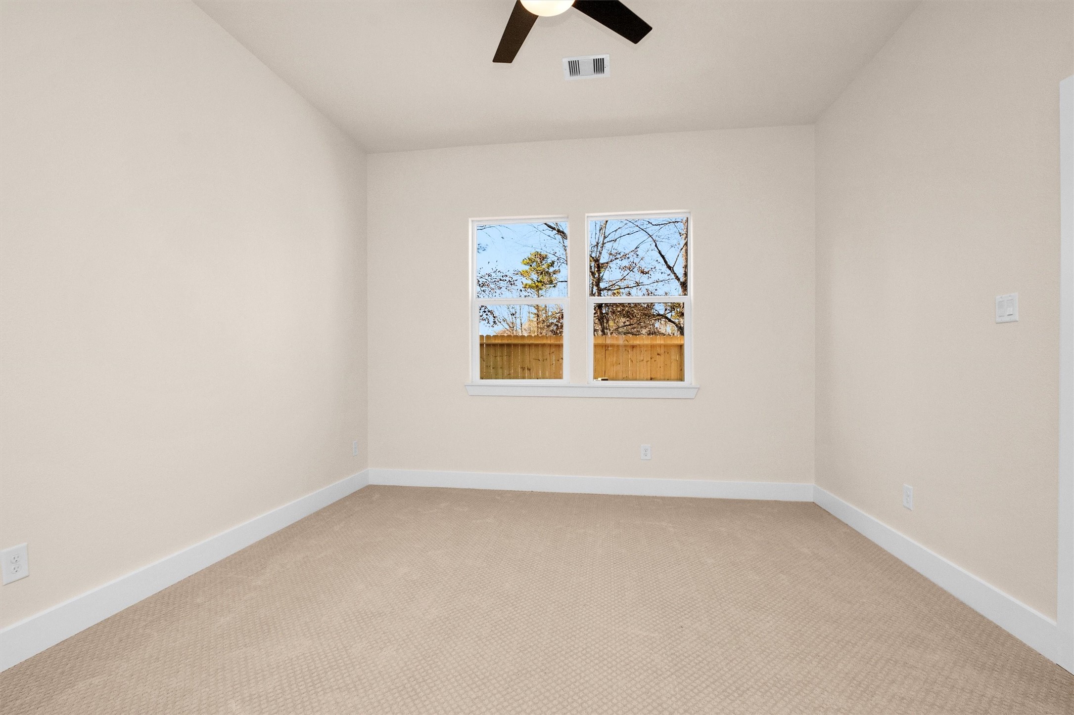 104 Canary St Point Point Blank, TX 77364 - Photo 21 of 28 an empty room with a window