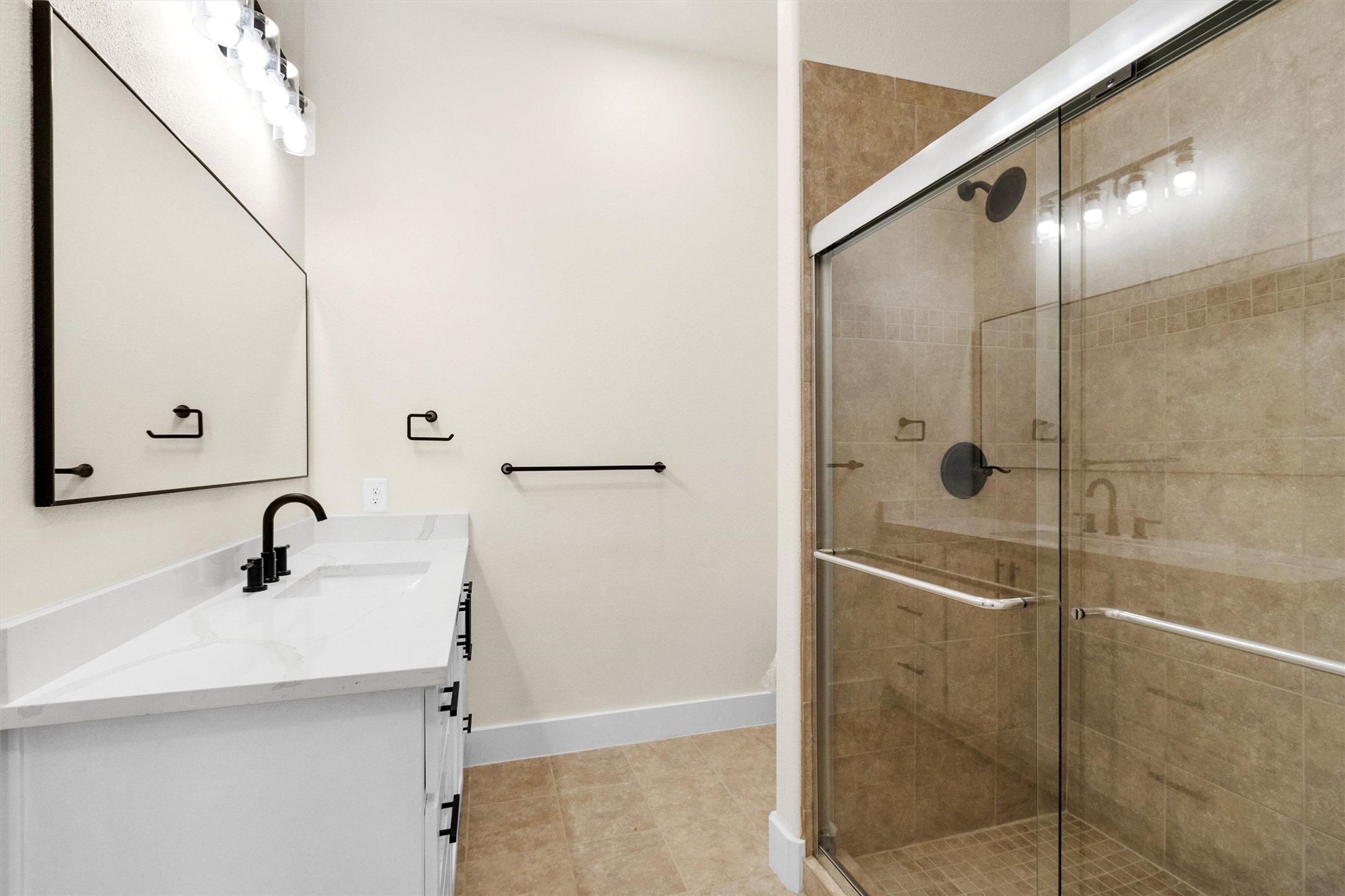 104 Canary St Point Point Blank, TX 77364 - Photo 23 of 28 a bathroom with a sink and a mirror
