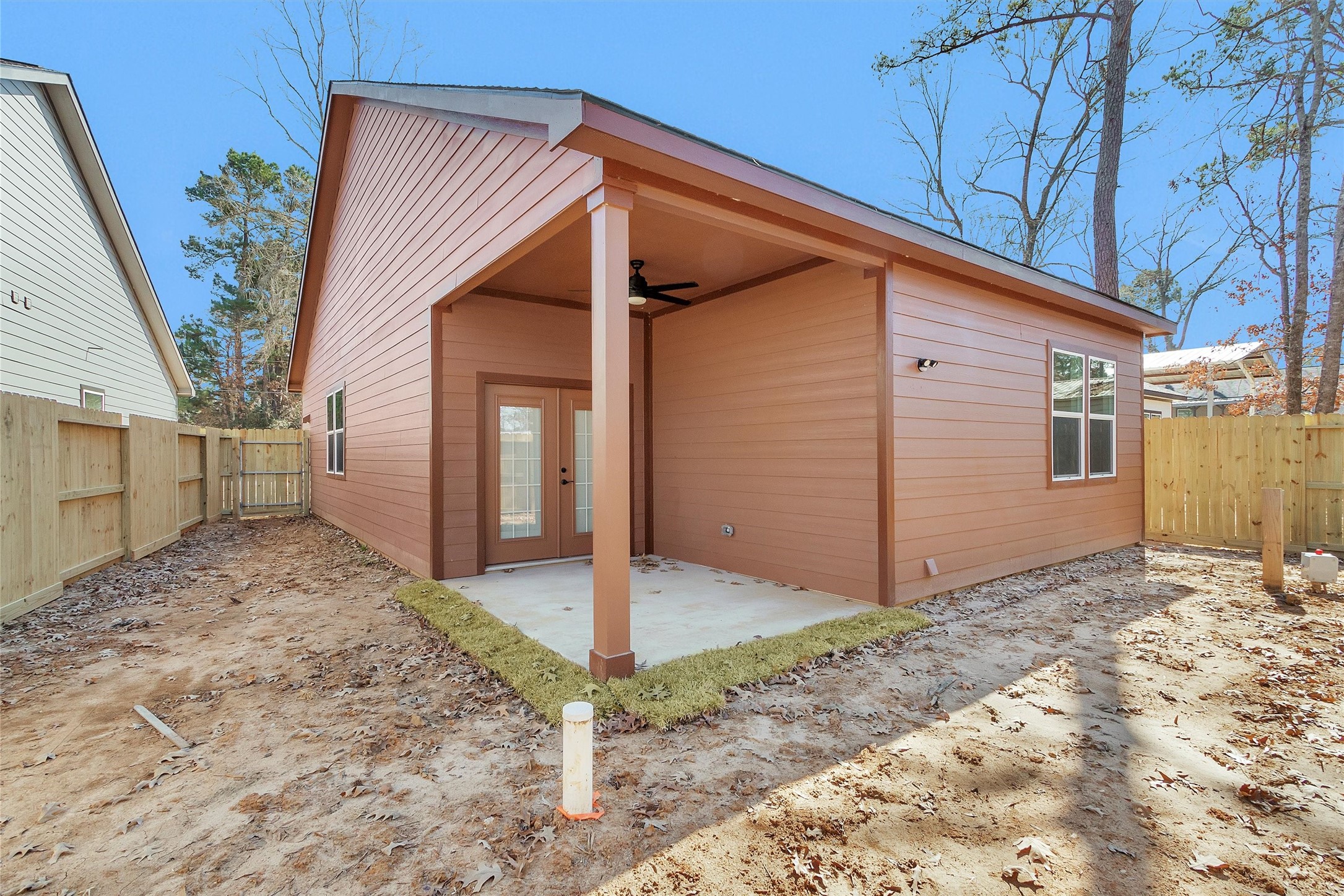 104 Canary St Point Point Blank, TX 77364 - Photo 27 of 28 a backyard of a house